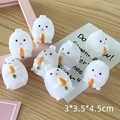 Cute white resin rabbit figurine holding a carrot, set of 7 miniature table decorations - Carrot Rabbit