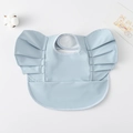 Waterproof baby bib in light blue with wing-shaped ruffle shoulders and a deep crumb pocket - Wings - Pure Blue / One Size