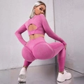 Pink seamless yoga set featuring long sleeve crop top with heart cutout and high waist leggings - S / Rose Red