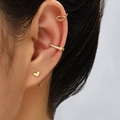 Gold heart stud earring with pave zirconia ear cuffs shown on a model's ear - Ne1226-Heart Stud Ear Cuff Set