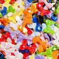 Colorful UV plated bow beads in assorted vibrant colors for DIY jewelry and crafts - Mixed Colors