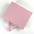 Elegant pink cardboard gift bag featuring high-quality satin ribbon handles and matte finish - Square: 15*15*15cm / Pink