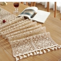 Detail of handmade crochet table runner with beige lace floral hollow out patterns and tassels - 30x350cm / Hexagon Flower Pattern with Tassels