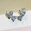 Boucles d'oreilles clous en argent avec double cœur en zircon et pierres scintillantes - Or Blanc