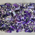 Bulk purple agate crystal pendants with silver metal bails and natural striped texture - Purple Agate
