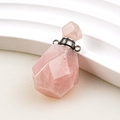 Pink crystal perfume bottle pendant with a geometric faceted design and metal ring - Rose Quartz Column