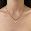 Elegante collana in acciaio inossidabile placcato oro 18 carati con ciondolo a forma di malocchio - Occhio del Diavolo Oro