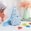 Detail of light blue nylon kids chest bag featuring a cartoon panda and star patterns - Panda