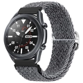 Detail view of grey nylon braided strap on a smartwatch with a dark metal case - Grey and White