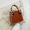 Mini orange box bag with gold chain strap and decorative silk scarf handle wrap - Dark Brown