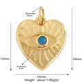 Golden heart-shaped evil eye pendant charm with blue stone inlay and radial texture - Gold Heart Blue Eye
