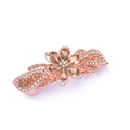 Detailed close-up of rose gold flower hair clip with amber rhinestones on a white background - Style H / Champagne