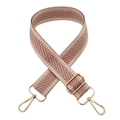 Close-up of beige chevron fabric bag strap with polished gold metal buckles and snap hooks - Lotus root pink