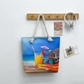 Linnen canvas strandtas met strandprint en dikke witte touwhandvatten voor de zomervakantie - Stijl 1