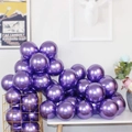Glossy metallic purple latex balloons displayed in a gold wire basket for party decor - Metallic Purple - Small