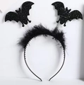 Detail of Halloween headband with black twin bats and delicate feather accents - Black Feather Black Bat