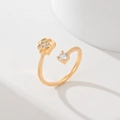 Adjustable gold plated open ring featuring a sparkling crown and a single zircon stone - Crown Design (JZ033)
