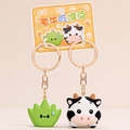 Set de llaveros divertidos de PVC con diseño de vaca y hierba para bolsos y parejas - Vaca comiendo hierba