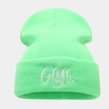 Close-up of the neon green ribbed knit beanie featuring detailed Gigi embroidery - One Size / Fluorescent Green