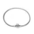 Macro shot of silver stainless steel snake chain bracelet with cylindrical clasp detail - Steel Color Cylinder Clasp