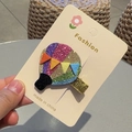 Glittery hot air balloon hair clip with vibrant rainbow sequins on a fashion display card - Hot Air Balloon + Gold Glitter Clip