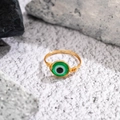 Handcrafted gold wire-wrapped ring with a vibrant green evil eye bead centerpiece - 01 Gold + Green (Evil Eye)