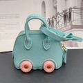 Mint green mini car-shaped litchi leather bag with pink wheels and gold rivets - Sky Blue