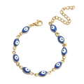 Golden Evil Eye bracelet featuring blue oval beads with a secure lobster clasp closure - Bracelet / Oval Blue