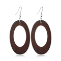 Detail shot of vintage brown oval wood earrings with natural grain and silver metal hooks - Style 52
