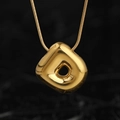 Golden organic bubble pendant necklace with polished finish on black marble background - Gold (D) (Large)