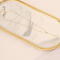 Golden butterfly necklace with white pearls on a marble tray over beige fabric background - Pearl Butterfly Thin Chain Style (6#)