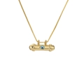 Macro detail of gold cylinder pendant with inlaid blue evil eye on square box chain - Horizontal Cylinder Evil Eye