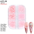 Mixed sizes of light pink flatback pearls for nail art in a 6-compartment storage box - 6-Grid Pearl ZZ08 (Light Pink Flatback Pearls)