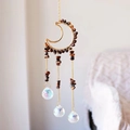 Detailed view of handmade moon suncatcher with crystal stones and glass prism ball - Tiger's Eye