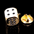 Detailed macro view of a gold dice brooch with black enamel dots and butterfly clasp - Gold Dice
