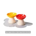 Polka dot ceramic mushroom pet bowls in yellow and red with a grey cloud mat - Elevated Mushroom Bowl Set with Mat (Red + Yellow)