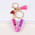 Letter V keychain with rose pink resin gradient sequins, heart charm, and silk tassel - Letter V