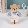 Brown teddy bear plush keychain in blue checkered shirt and beige overalls on a desk - Blue Bowknot Male Bear / 11cm