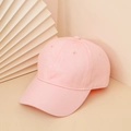 Classic pastel pink cotton baseball cap with curved brim on a stylish minimalist background - Light Pink