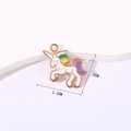 White enamel unicorn charm in golden finish with pink and purple details, 2.3cm x 2cm - Colorful Unicorn