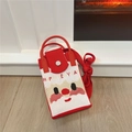 Close-up of red knitted Christmas mini bag featuring a Santa Claus face pattern and snap button - Santa Claus Red