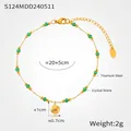 Bracelet de cheville en acier titane doré avec perles vertes et pendentif coquillage - Longueur env. 20+5cm / Or - Style Coquillage Perles Vertes