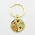 Golden keychain featuring a glass dome pendant with Van Gogh's Sunflower painting art - Gold-Sunflowers F