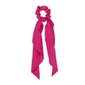 Detailed view of a soft pink satin ponytail scrunchie with long streaming ribbons - Crinkled Rose Red