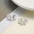 Minimalist silver ear cuff with five pearls in a fan shape over a two-tone background - Silver Artificial Pearl Style (ZYN-DME453P)