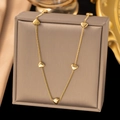 Elegant 18K gold plated necklace with five polished heart charms on a dainty chain - Vertical 8 Hearts Necklace / Gold