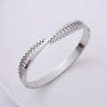 Bracciale rigido in argento lucido a corona con accenti in zirconi scintillanti - Color Acciaio