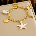 Golden stainless steel ocean charm bracelet with starfish, turtle, and dolphin pendants - Conch Turtle Starfish Style (B1731)