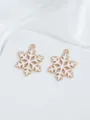 Detailed macro of white enamel snowflake charms with gold metal base for DIY jewelry making - Snowflake Pendant (39)