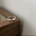 Minimalist silver open ring featuring geometric cube and sphere accents on wood - Geometric Cube Sphere Open Ring (J3960)
